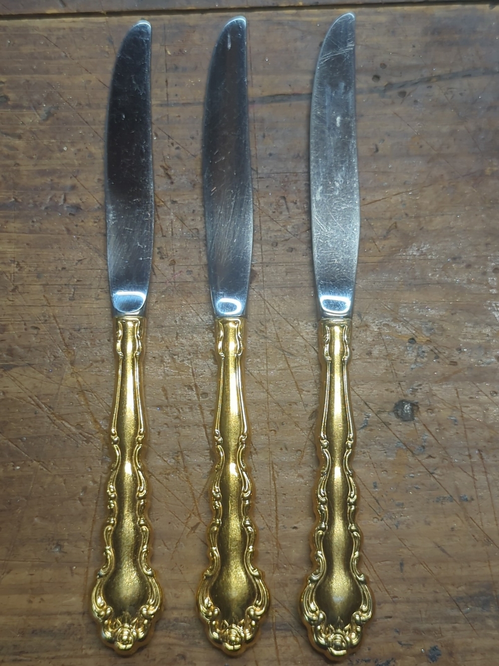 Set of 3 Oneida Community Gold Ornate Gold-Handled Table Knives